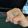 Anello con quarzo rutilato, diamanti e smeraldi