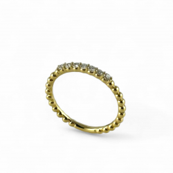 Anello veretta in oro rosa con cinque pietre