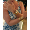Bracciale rigido forato in ottone dorato